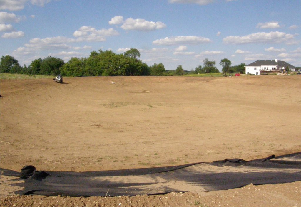 Start of pond liner installation.