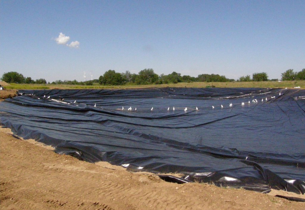 Pond liner panels installed.