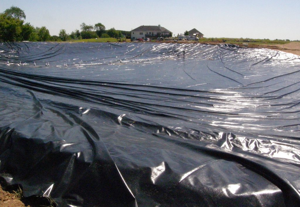 Pond liner panels installed.