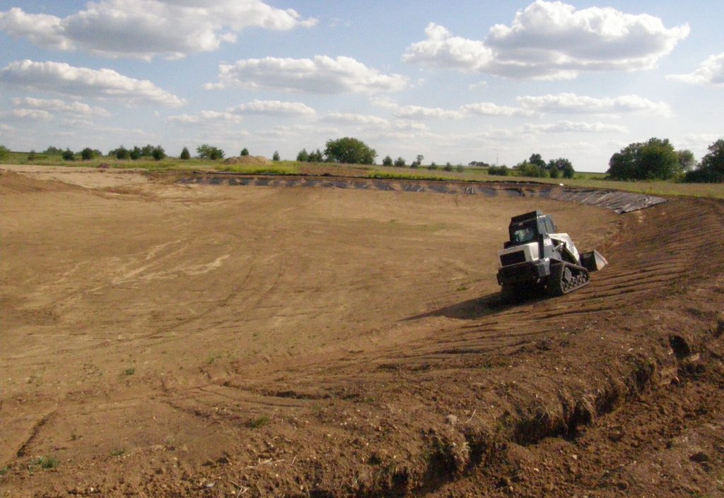 The pond begins to take shape.