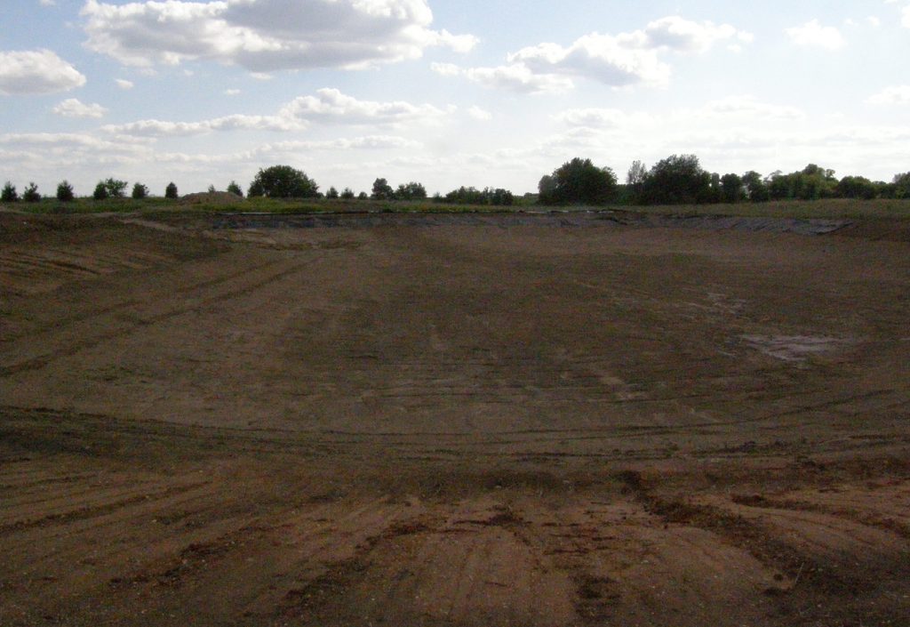 Empty field - The perfect location for a pond