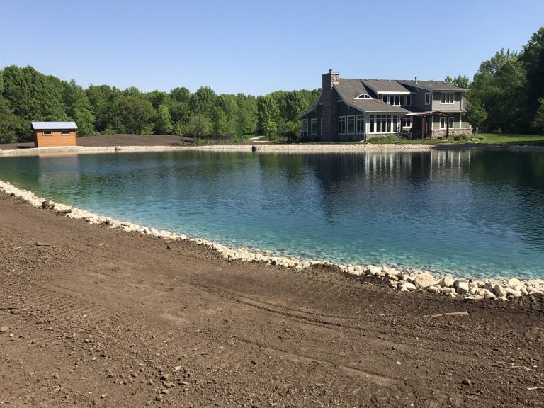 Fish, Swim, and Relax in this 1/2 Acre Backyard Pond! featured image