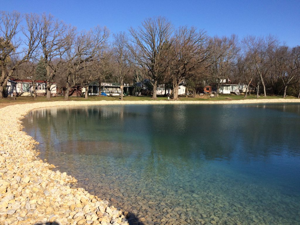 stone riprap, pond