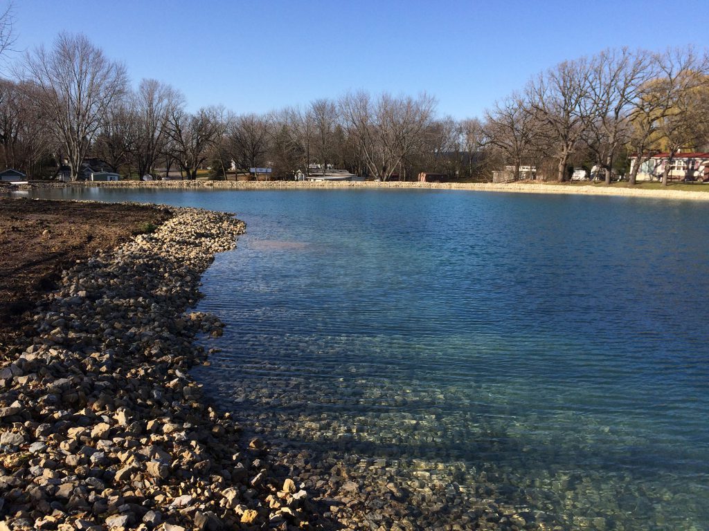 stone riprap, pond