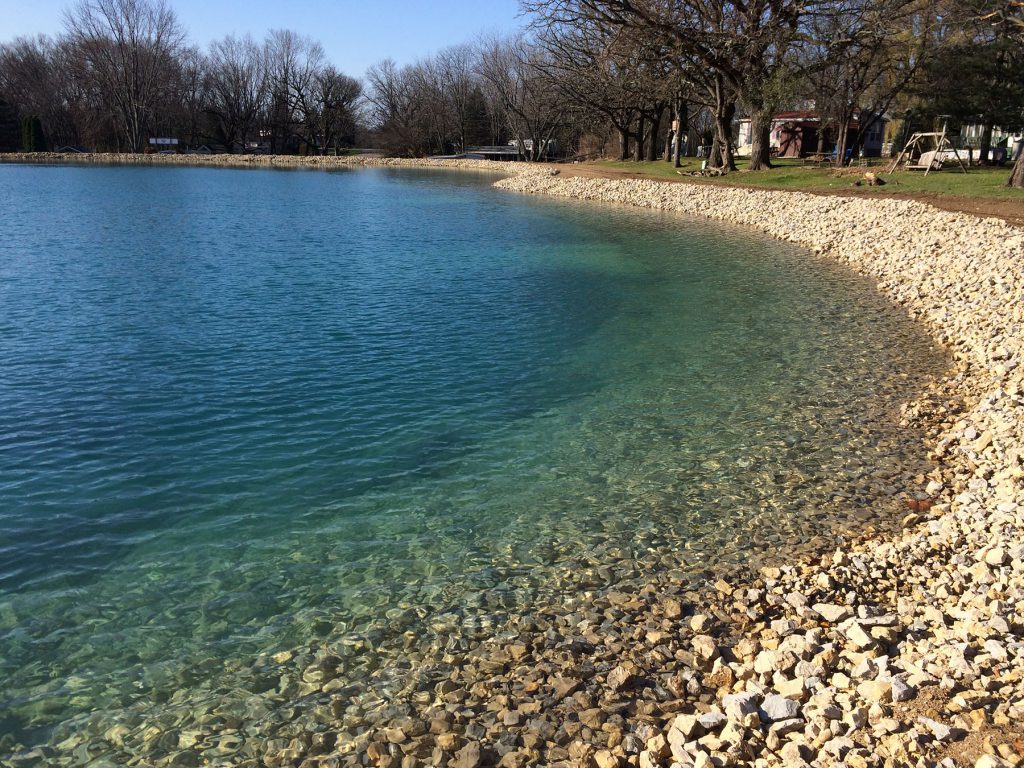 stone riprap, pond