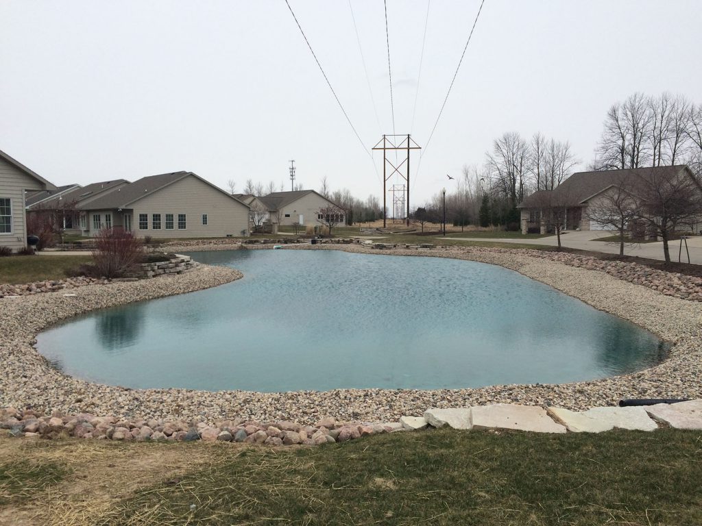 stone riprap, new pond