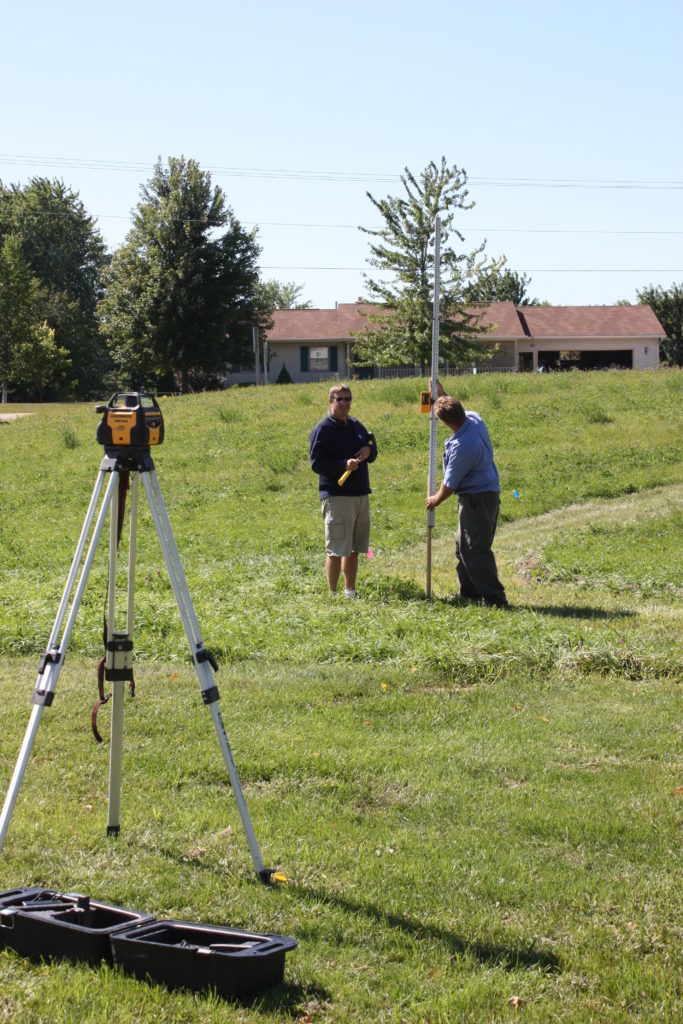 Backyard swim pond site planning and preparation