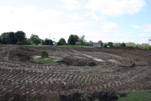 Backyard swim pond ground preparation and excavation