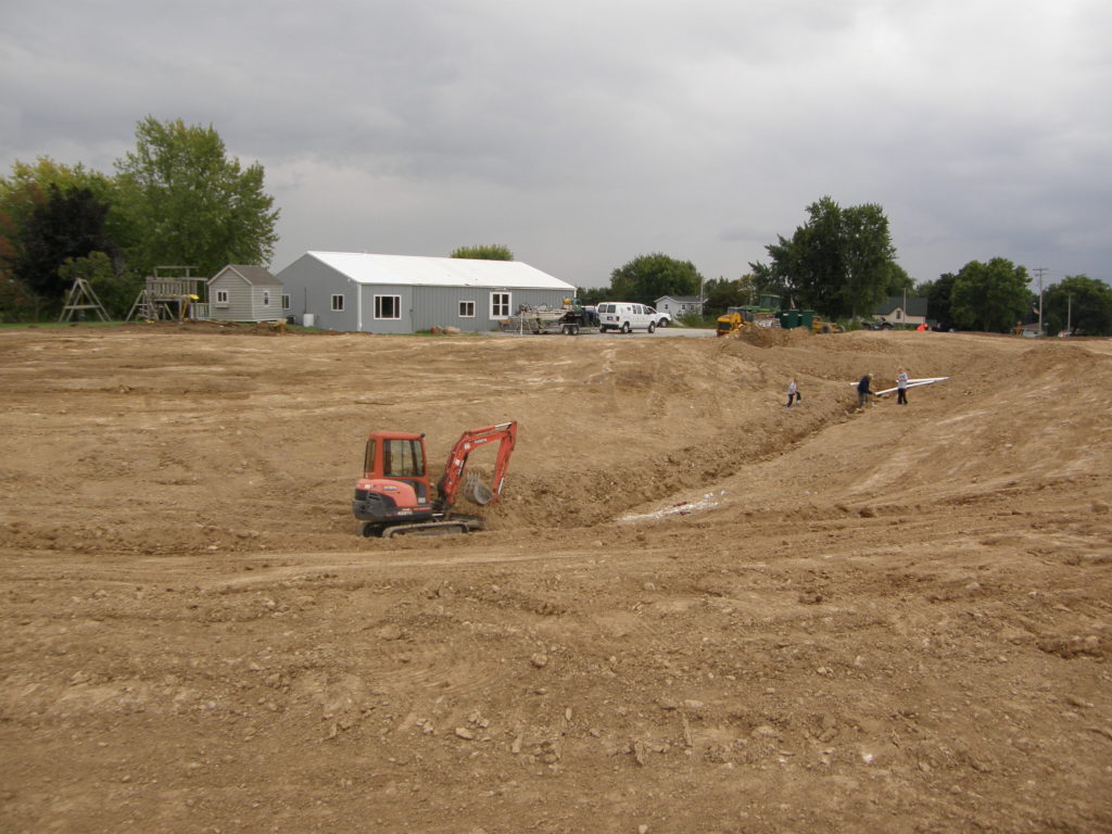 Backyard swim pond excavation