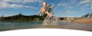 kid splashing water
