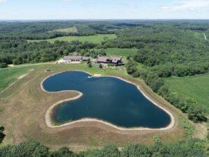 Aerial view of beautiful backyard pond 2022